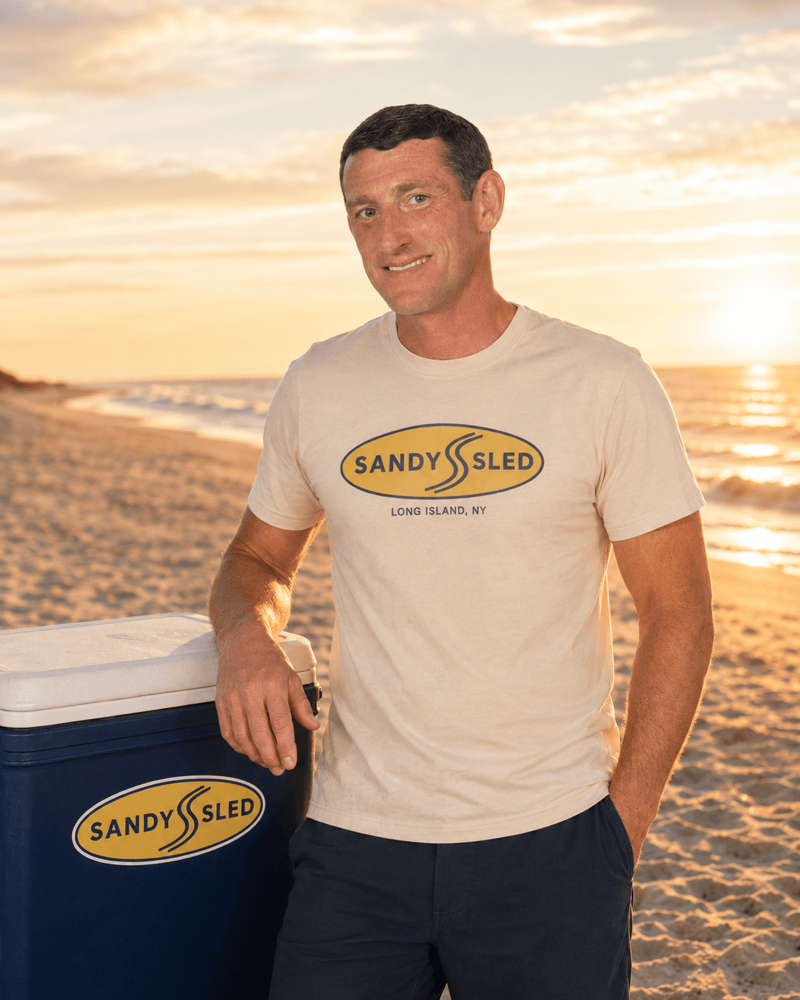 Chris Walsh, founder of SandySled, on a Long Island beach