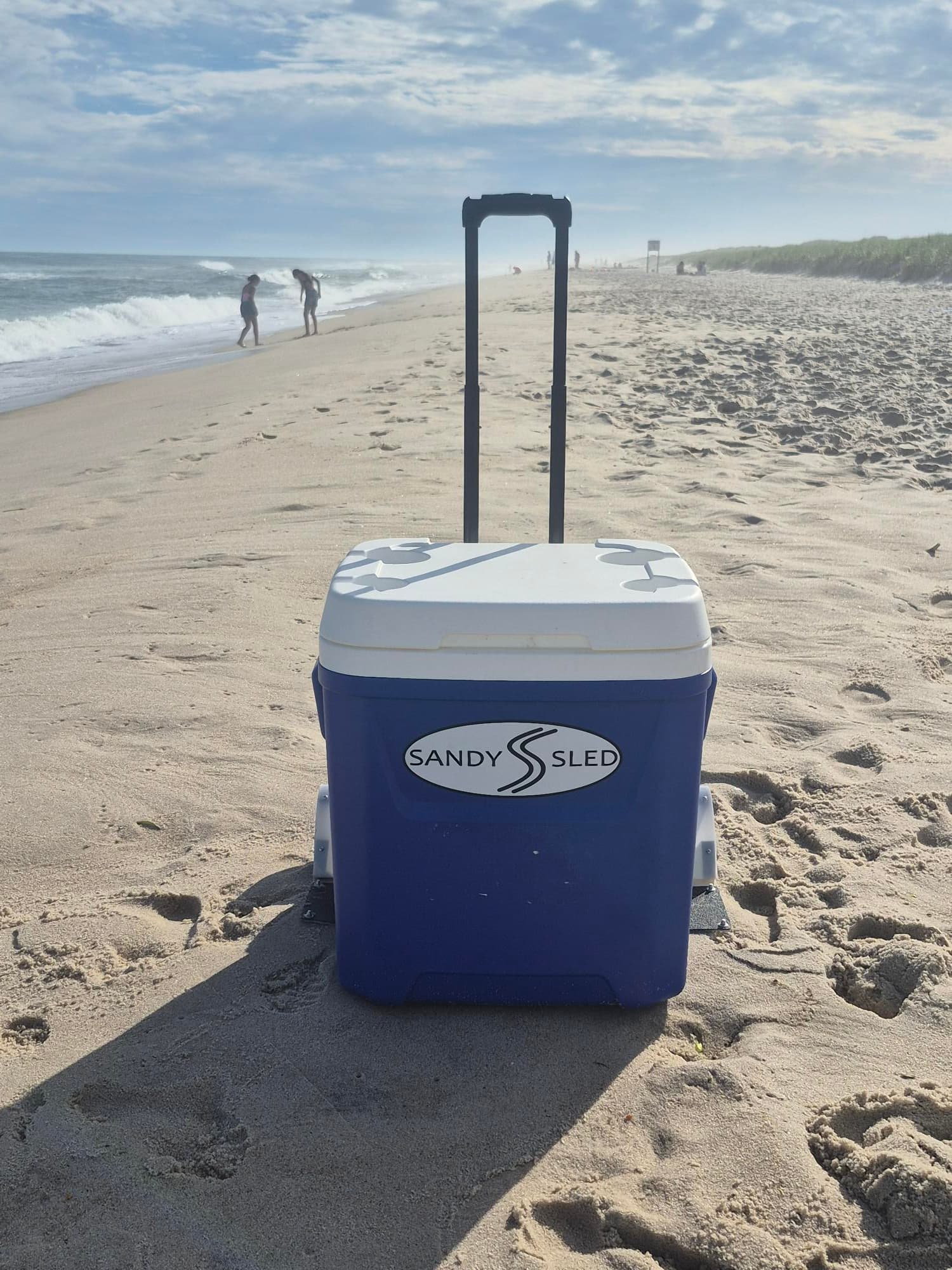 Wheeled cooler setup using SandySled on sand